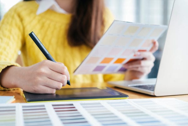 image of a female designer to illustrate the point of wordpress web design
